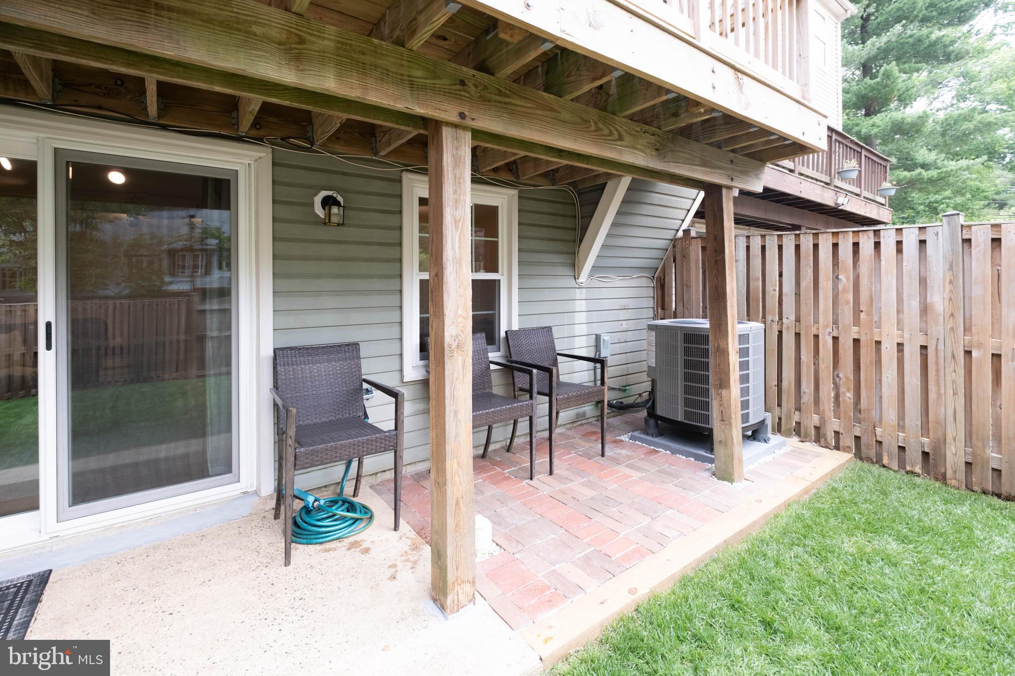 8174 Cliffview Avenue Springfield, VA 22153 - Photo 52 of 55 Rear patio has hose w/timer (conveys)