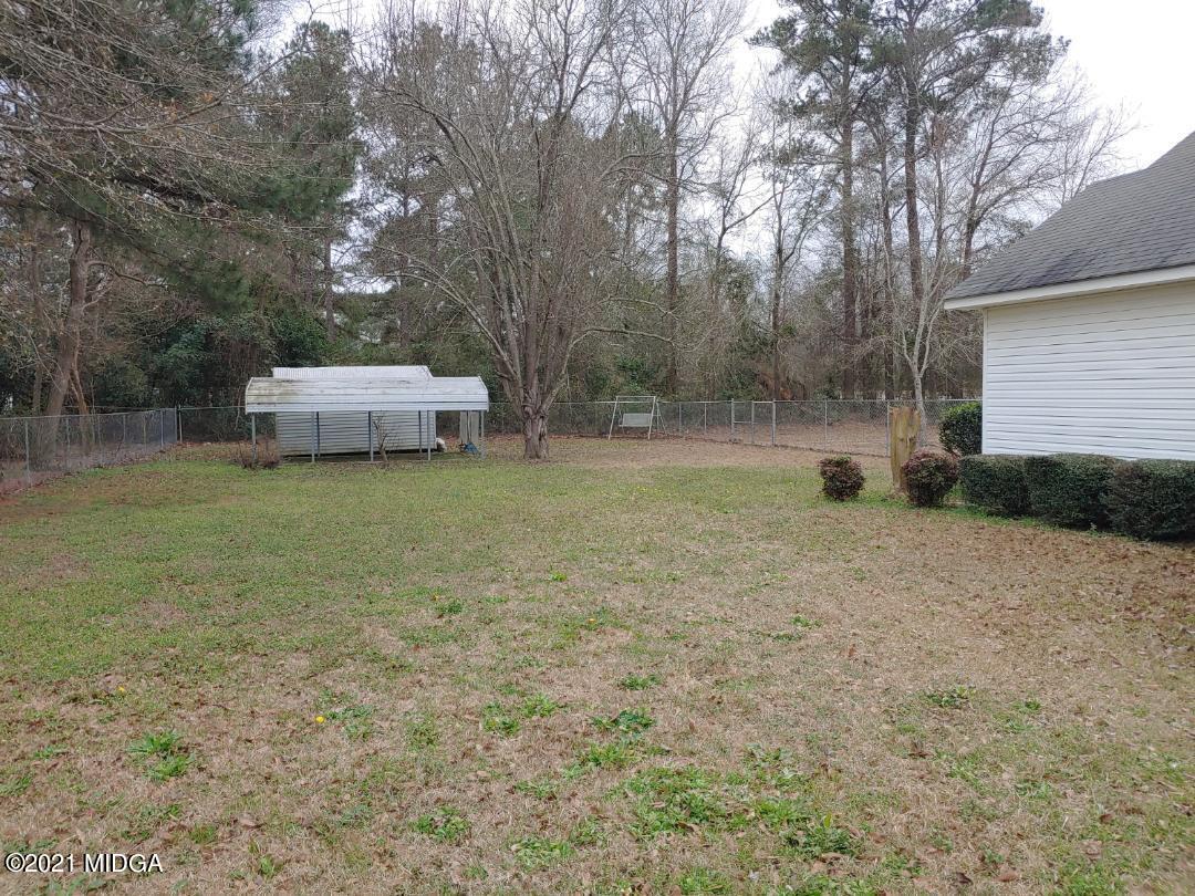 6210 Skipperton Road Macon, GA 31216 - Photo 2 of 15 a view of a backyard with large trees