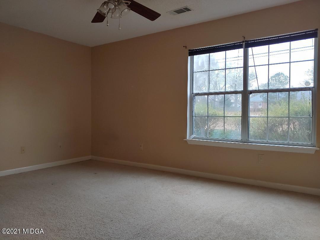 6210 Skipperton Road Macon, GA 31216 - Photo 4 of 15 an empty room with a window