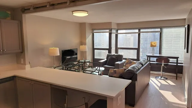 a kitchen that has a sink and cabinets