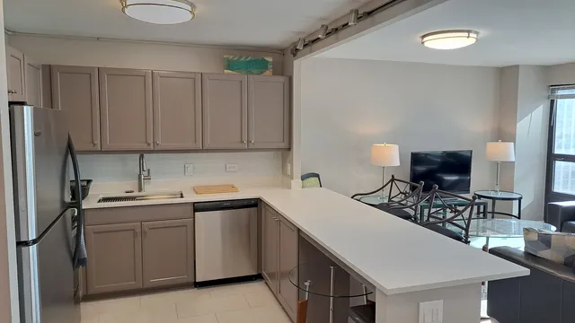 a bedroom with bed and window