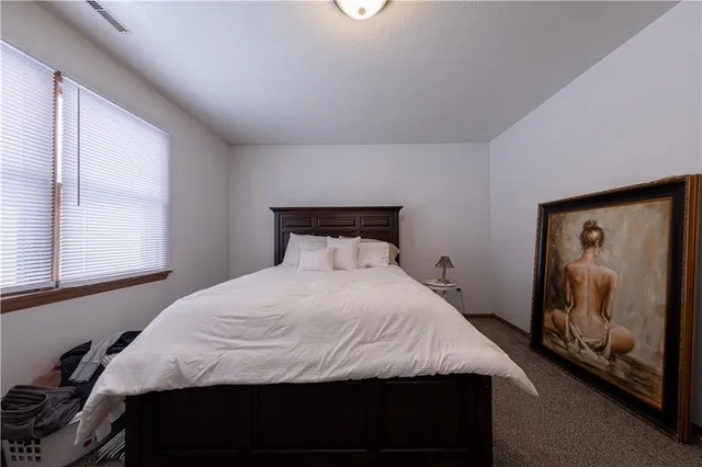 a kitchen with stainless steel appliances granite countertop a refrigerator stove and sink