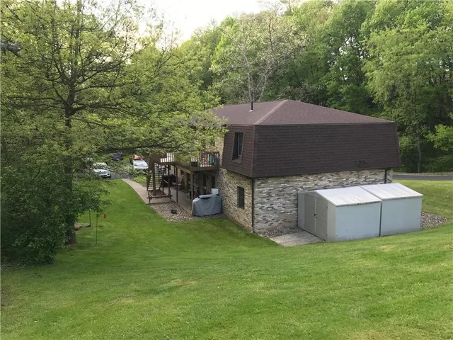 a kitchen with a sink and a stove top oven