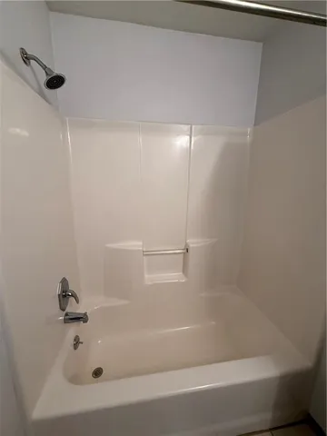 a front view of a house with a glass door