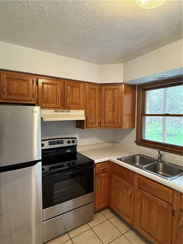 a view of a table and chairs in patio