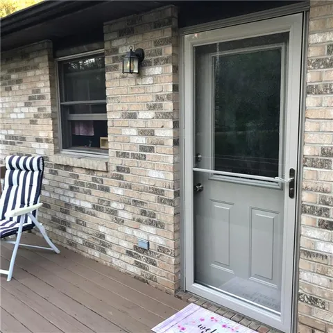 an aerial view of multiple house with yard