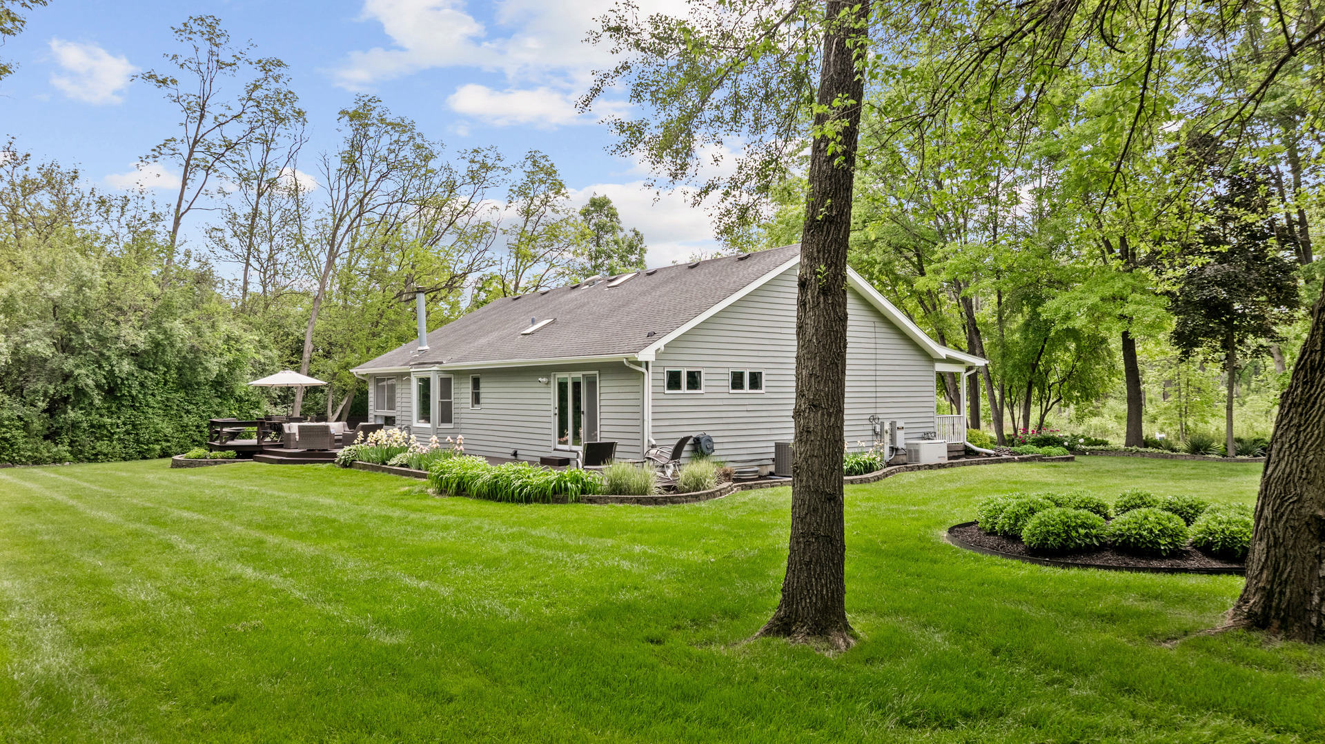 28W140 Mack Road Wheaton, IL 60189 - Photo 3 of 48 a front view of house with yard and green space
