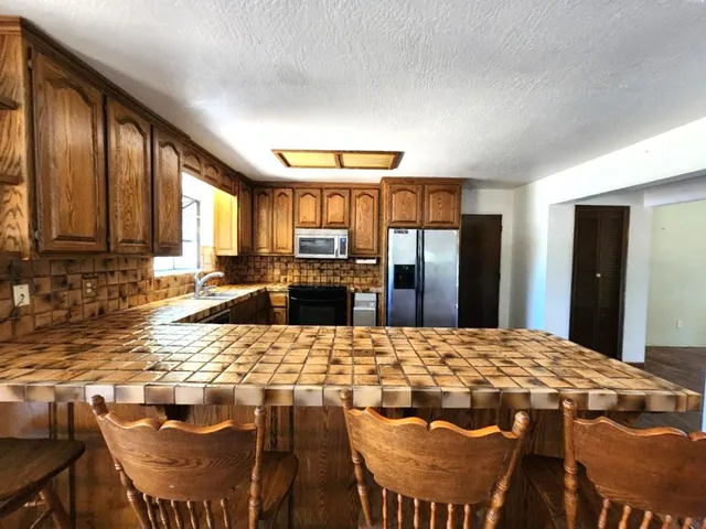 a view of entryway and workspace