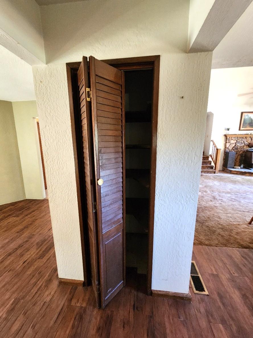 1925 Skull Flat Road West Point, CA 95255 - Photo 17 of 86 a view of a hallway with wooden floor and stairs