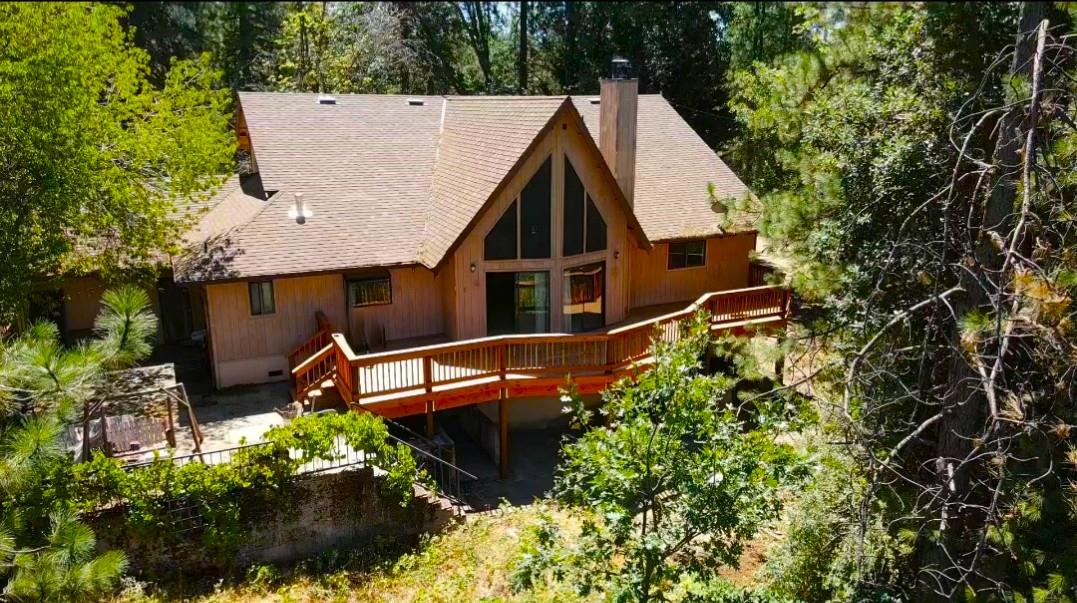 1925 Skull Flat Road West Point, CA 95255 - Photo 3 of 86 an aerial view of a house with swimming pool and garden