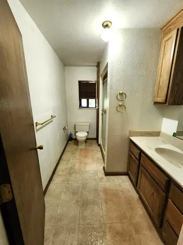 a view of a backyard with potted plants