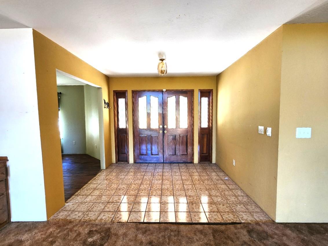 1925 Skull Flat Road West Point, CA 95255 - Photo 6 of 86 a view of a hallway with wooden floor and a bathroom