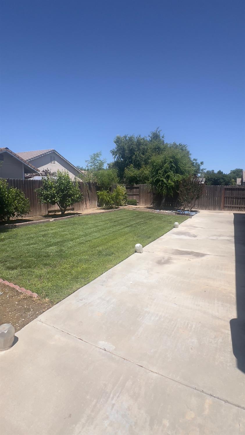 5221 East Byrd Avenue Fresno, CA 93725 - Photo 15 of 15 a view of a lake with a mountain in the background