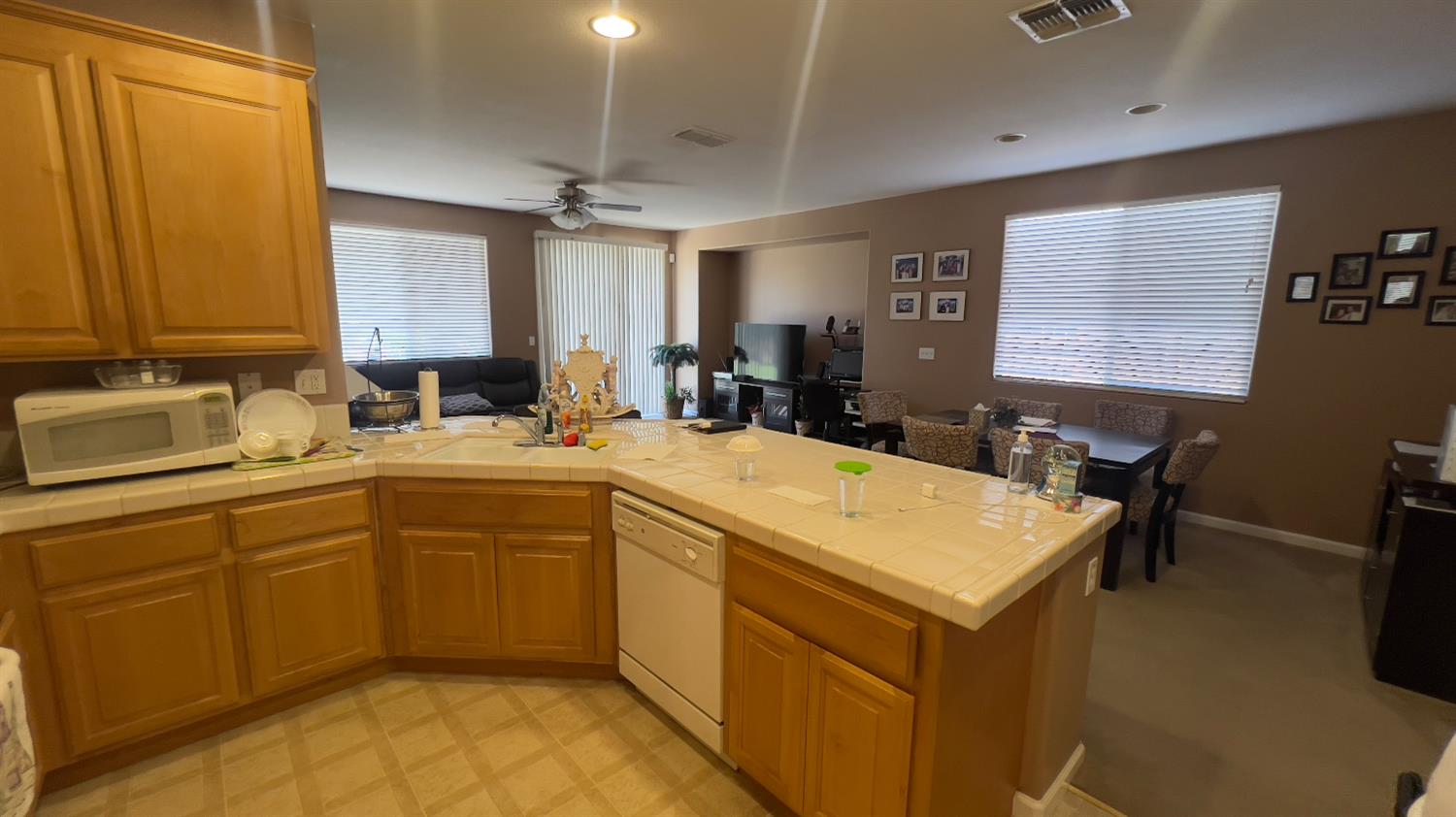 5221 East Byrd Avenue Fresno, CA 93725 - Photo 6 of 15 a room with sink cabinets and appliances