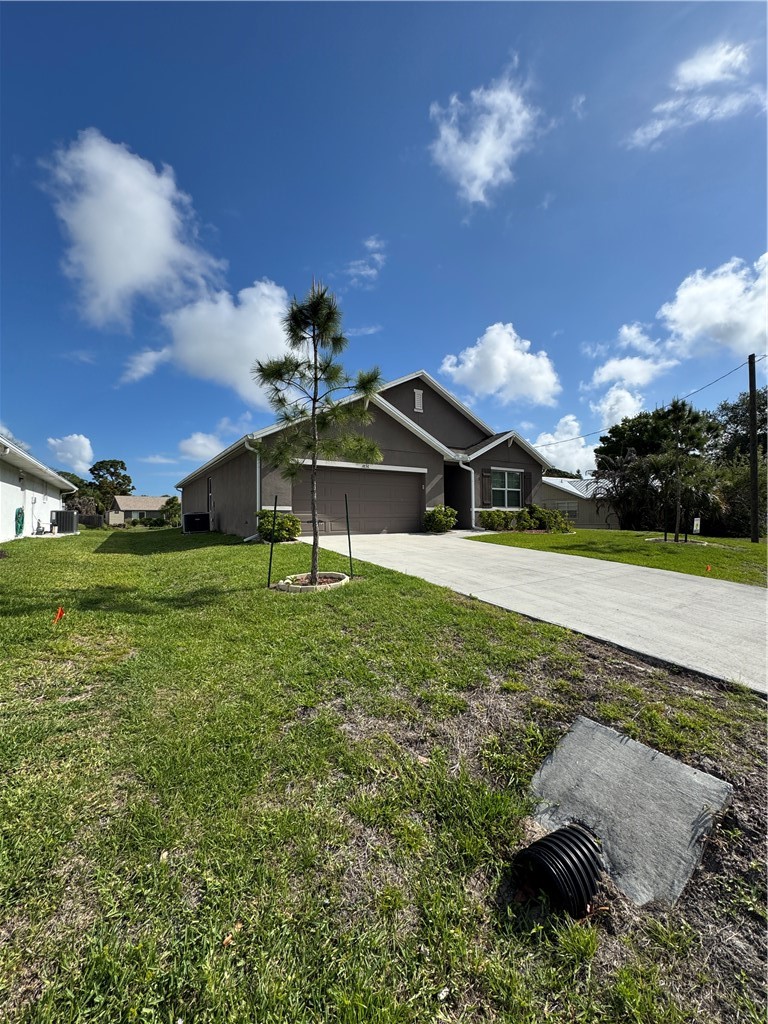 1836 Barber Street Sebastian, FL 32958 - Photo 2 of 29 a view of a garden with a stove