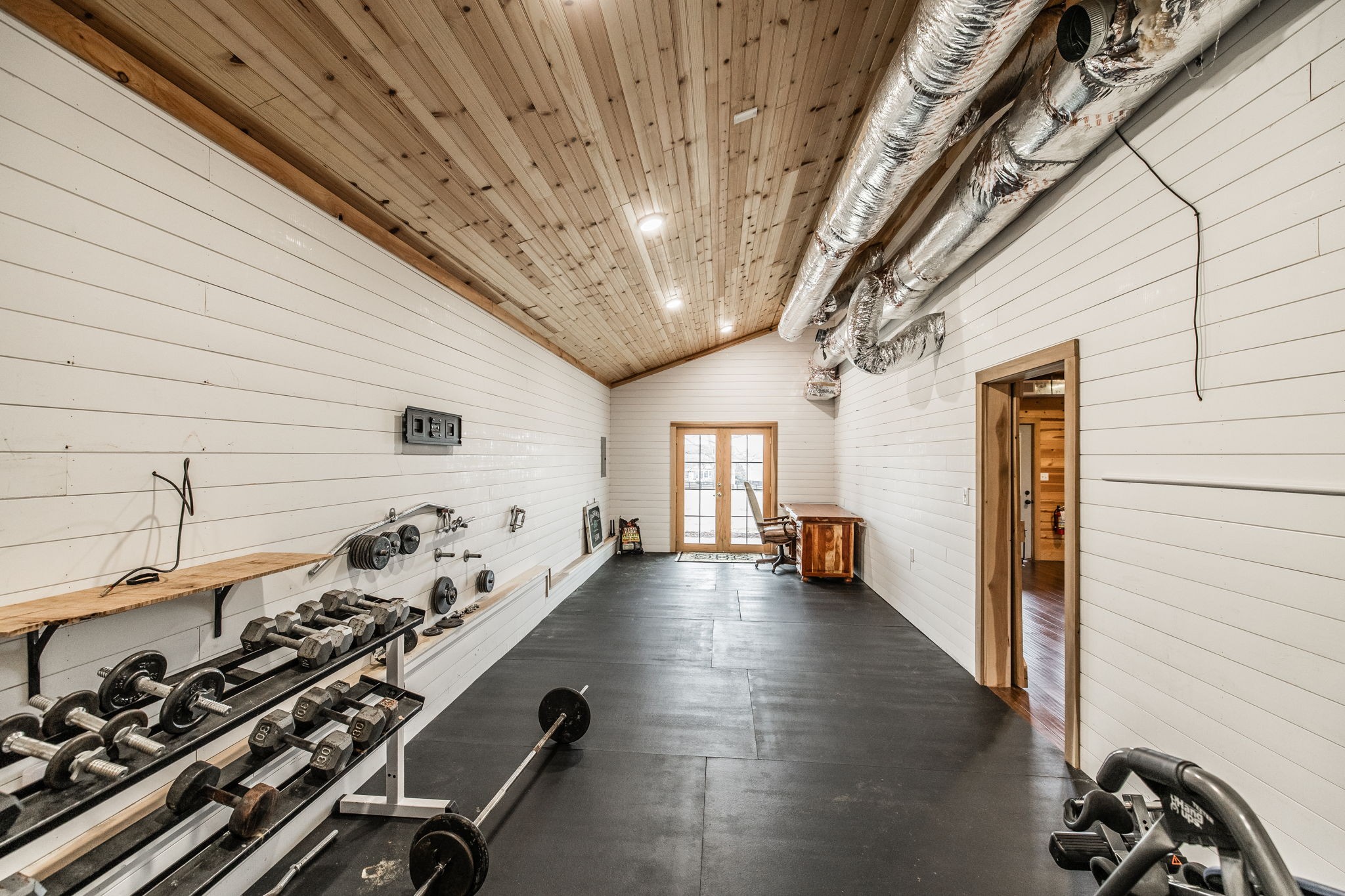 8137 Shoals Branch Road Primm Springs, TN 38476 - Photo 53 of 69 a view of a room with gym equipment