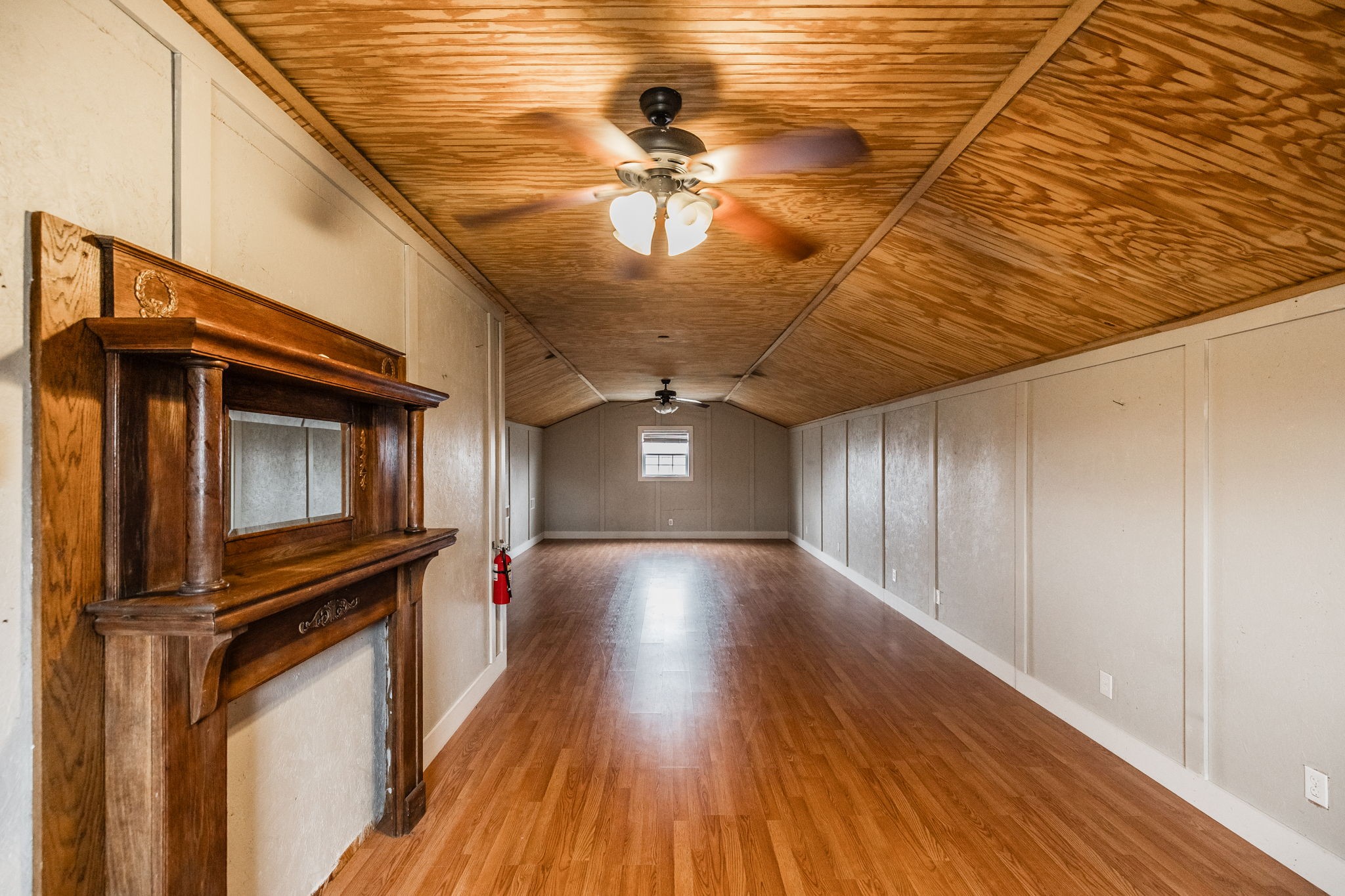 8137 Shoals Branch Road Primm Springs, TN 38476 - Photo 54 of 69 a view of a hallway with wooden floor and staircase