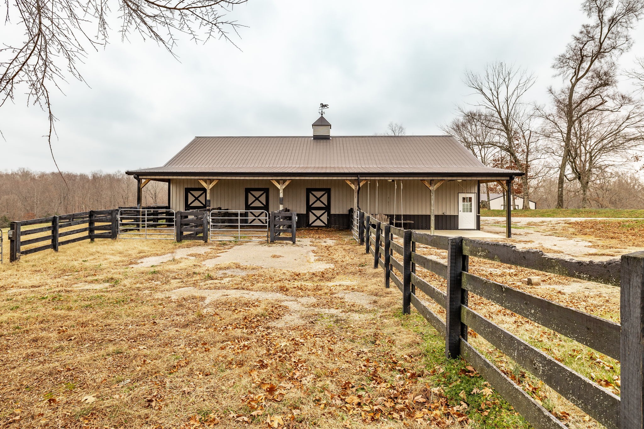 8137 Shoals Branch Road Primm Springs, TN 38476 - Photo 62 of 69 a front view of a building with sitting area