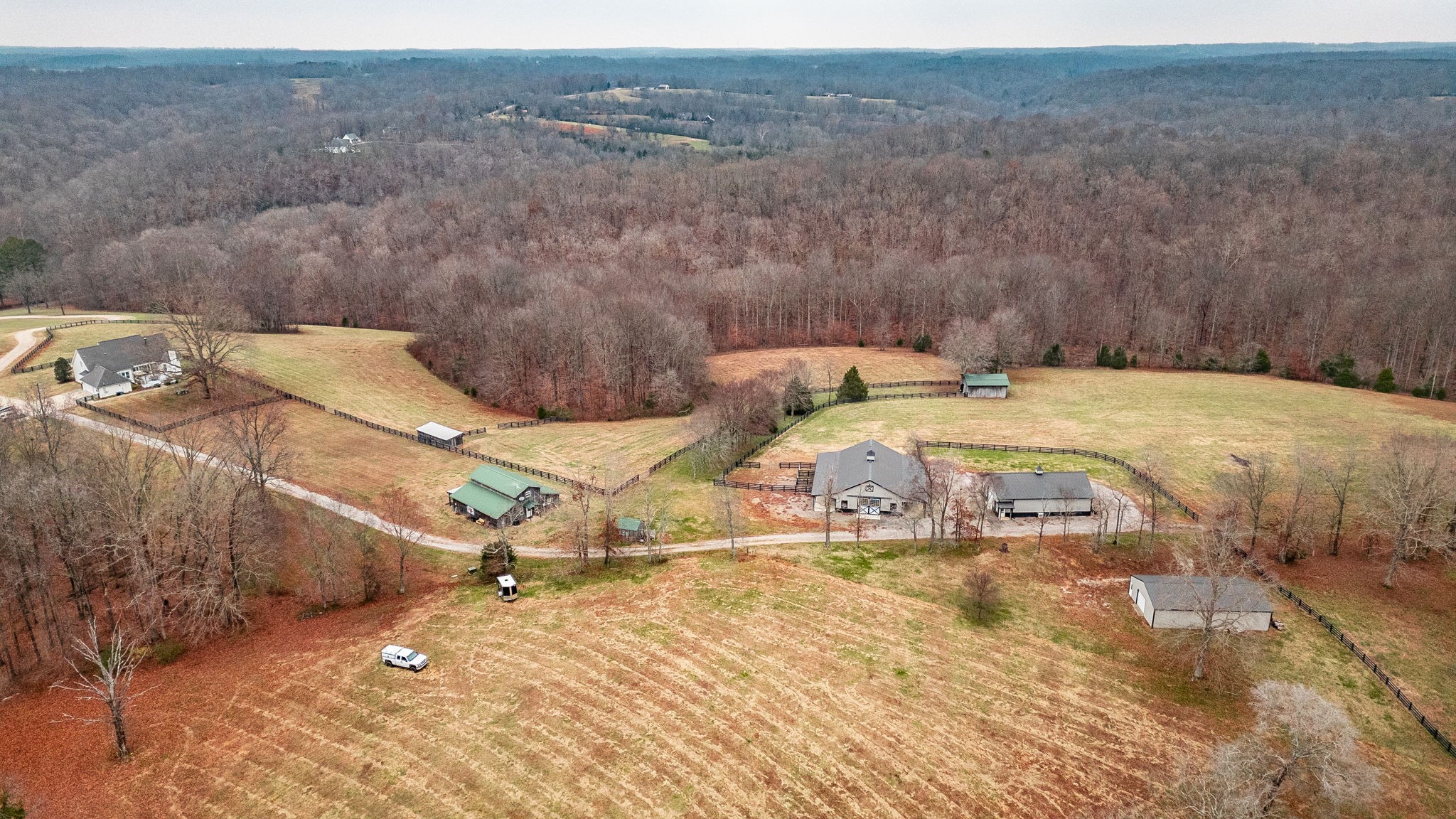 8137 Shoals Branch Road Primm Springs, TN 38476 - Photo 68 of 69 a view of a backyard with table and chairs