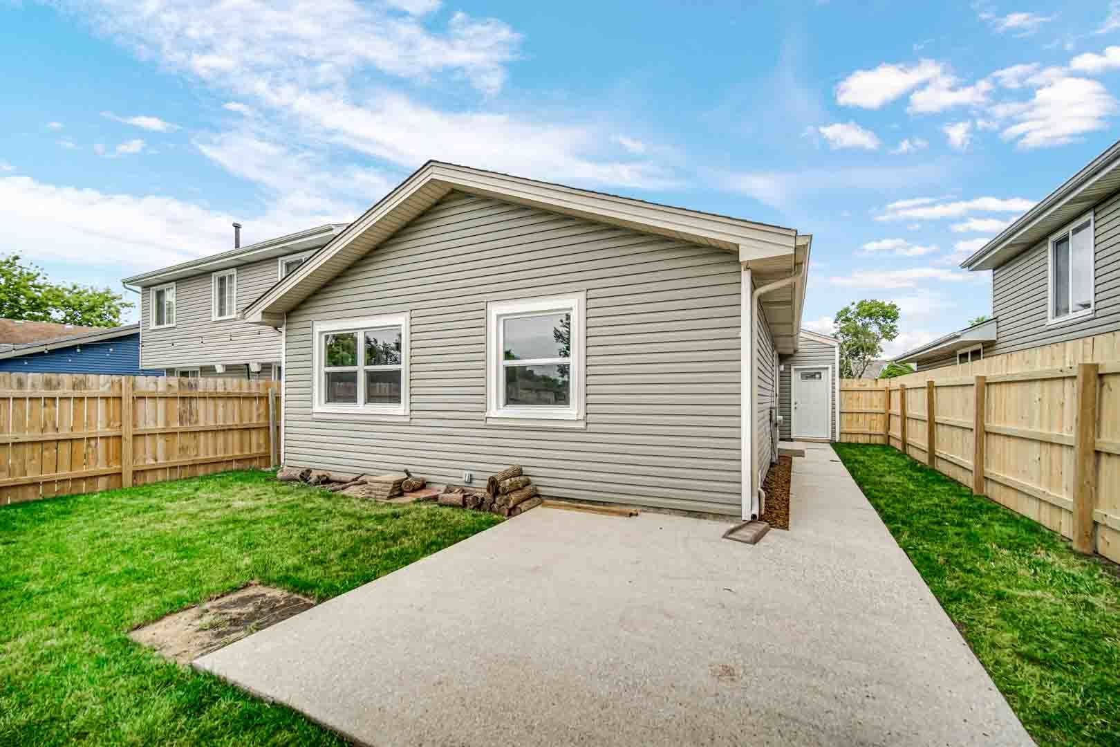 9215 Fox Court Orland Hills, IL 60487 - Photo 4 of 21 a front view of a house with a yard