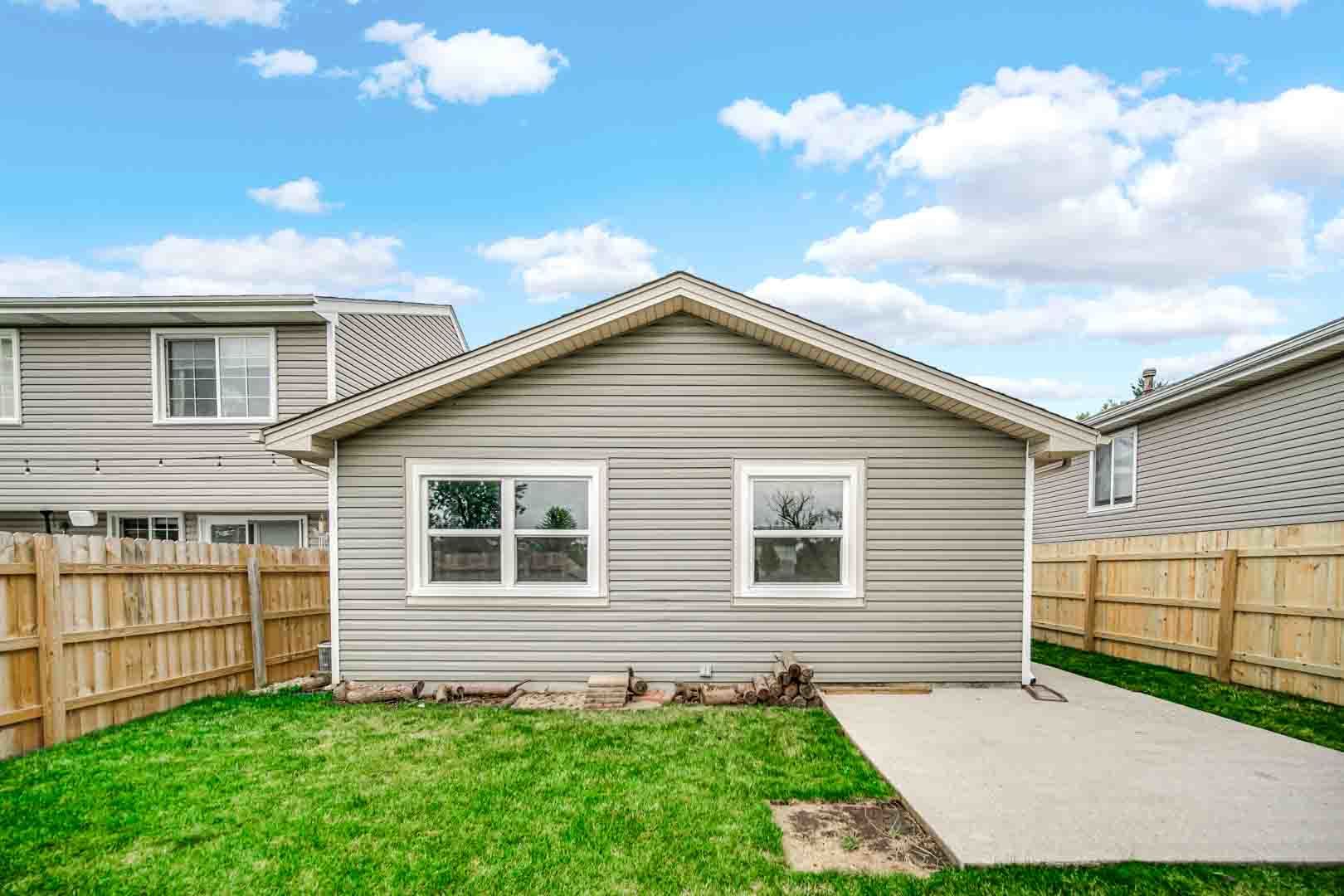 9215 Fox Court Orland Hills, IL 60487 - Photo 5 of 21 a front view of a house with a garden