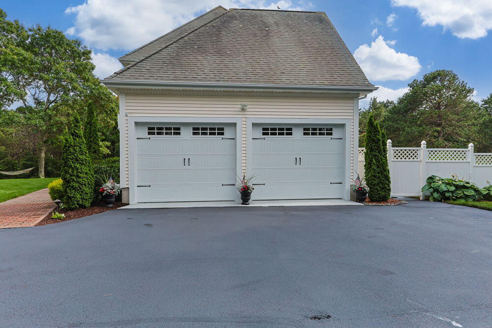 29 Weather Deck Road Bourne, MA 02532 - Photo 54 of 65 Attached 2-Car Garage on the Right
