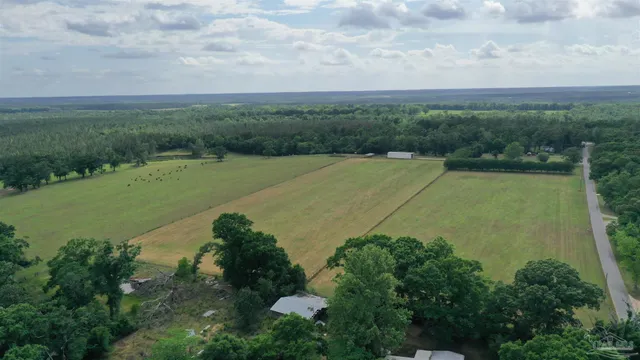 a view of a lake with a yard