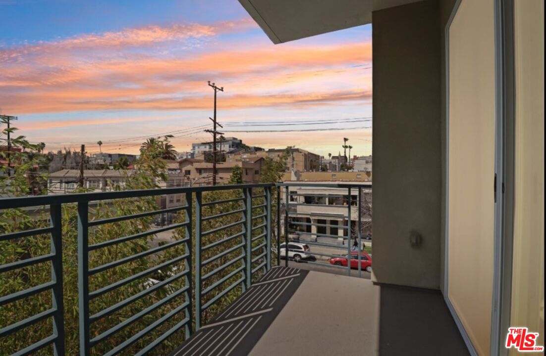 903 South New Hampshire Avenue, Unit 303 Los Angeles, CA 90006 - Photo 11 of 33 a view of a balcony with city view