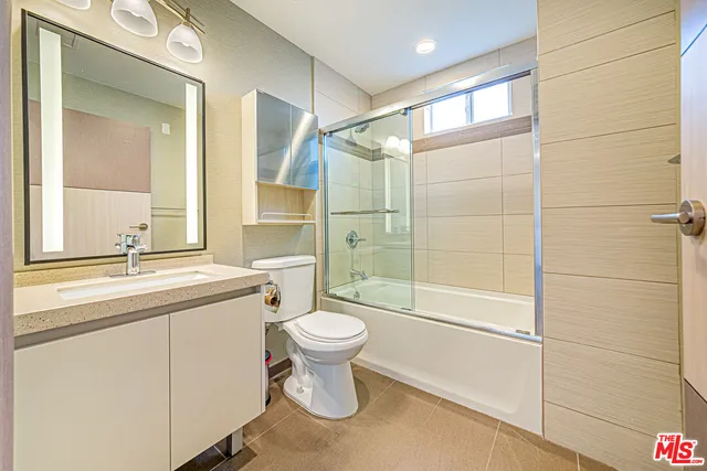 a utility room with washer and dryer
