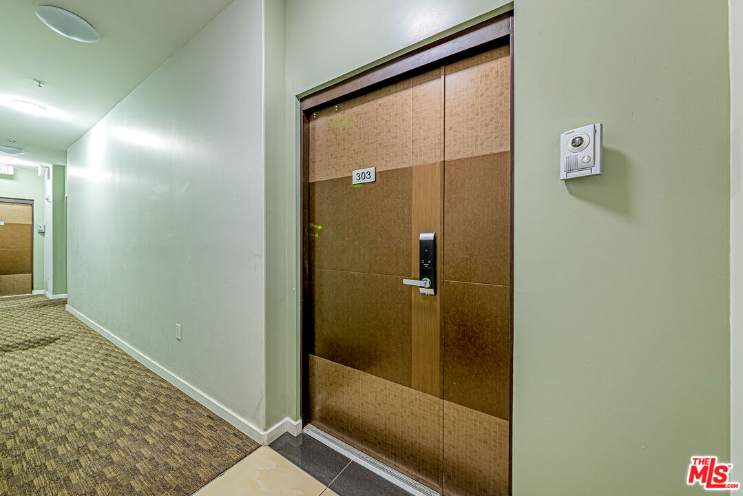 903 South New Hampshire Avenue, Unit 303 Los Angeles, CA 90006 - Photo 23 of 33 a bathroom with a shower