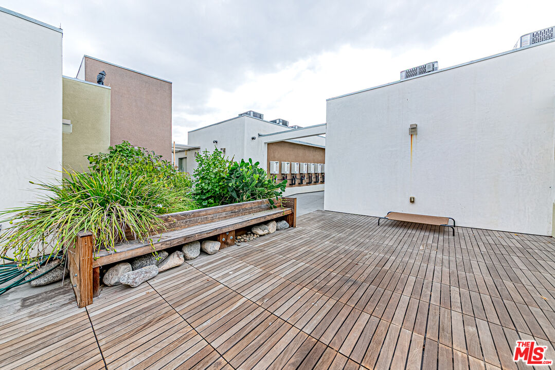 903 South New Hampshire Avenue, Unit 303 Los Angeles, CA 90006 - Photo 30 of 33 a view of a terrace with sky view