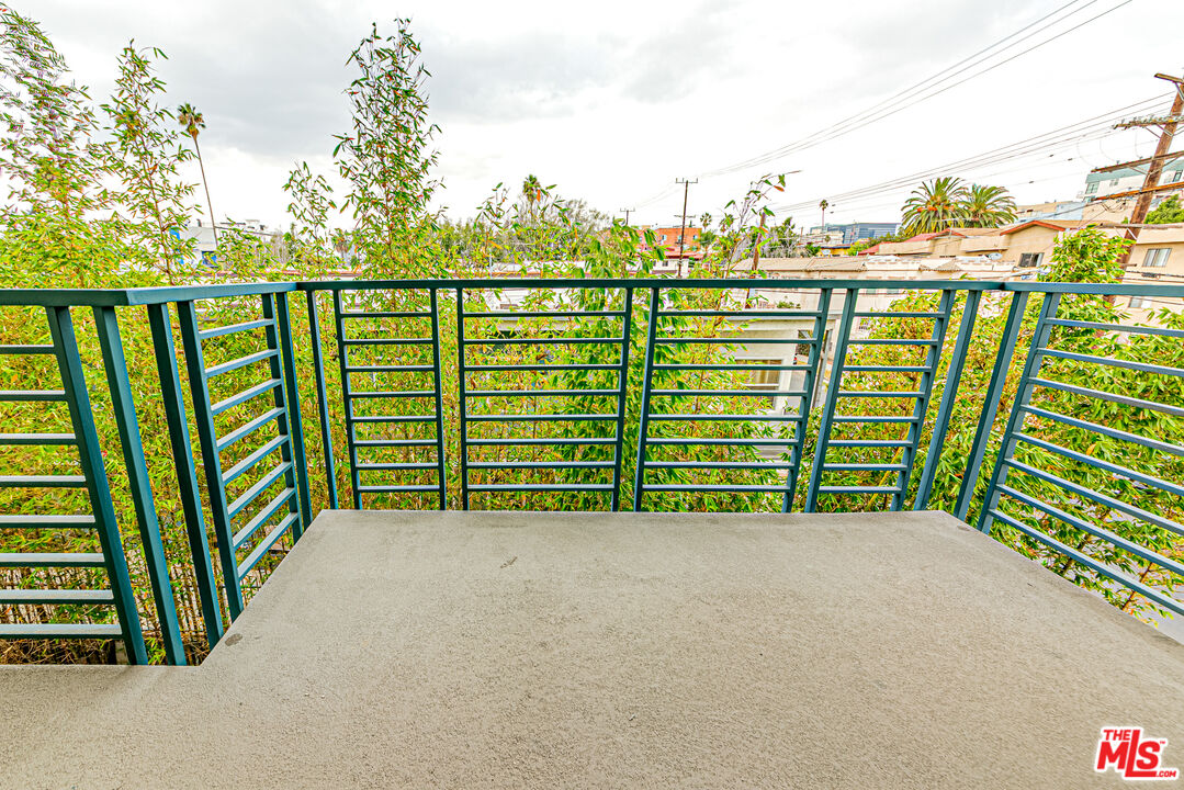903 South New Hampshire Avenue, Unit 303 Los Angeles, CA 90006 - Photo 10 of 33 a view of a street view from a balcony