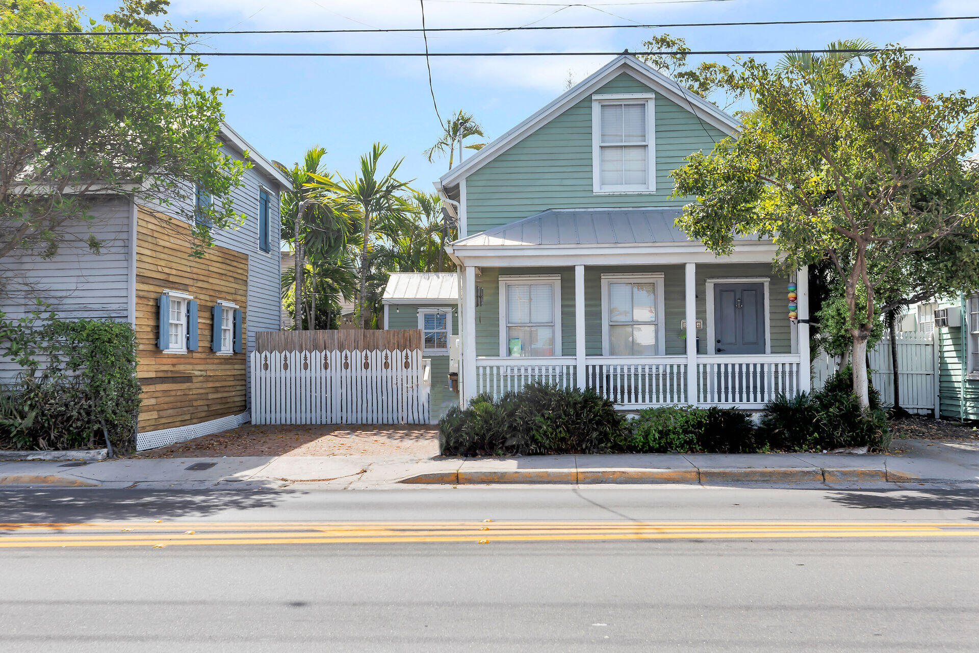 a view of a house next to a yard
