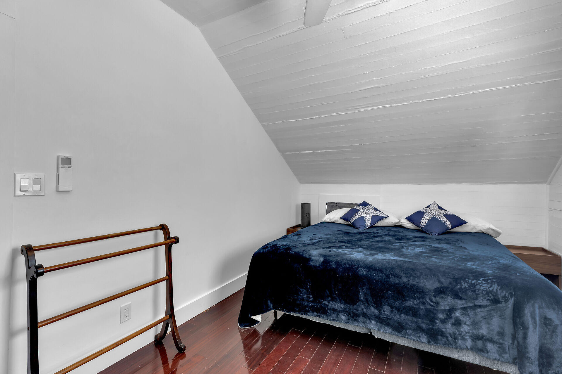 1124 Eaton Street Key West, FL 33040 - Photo 16 of 28 a bedroom with a bed and a window