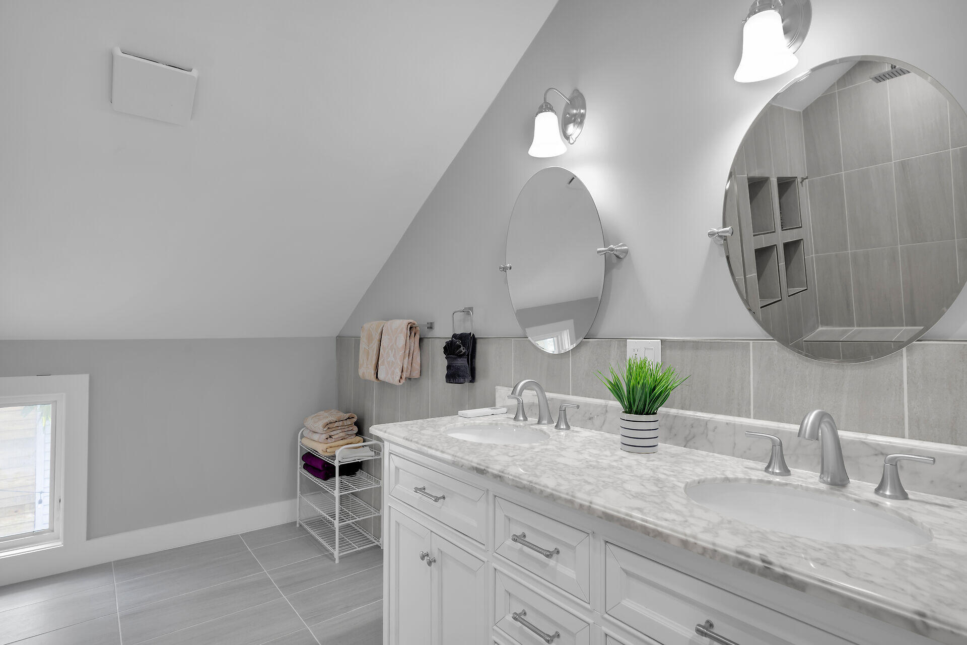 1124 Eaton Street Key West, FL 33040 - Photo 18 of 28 a bathroom with double vanity and a mirror