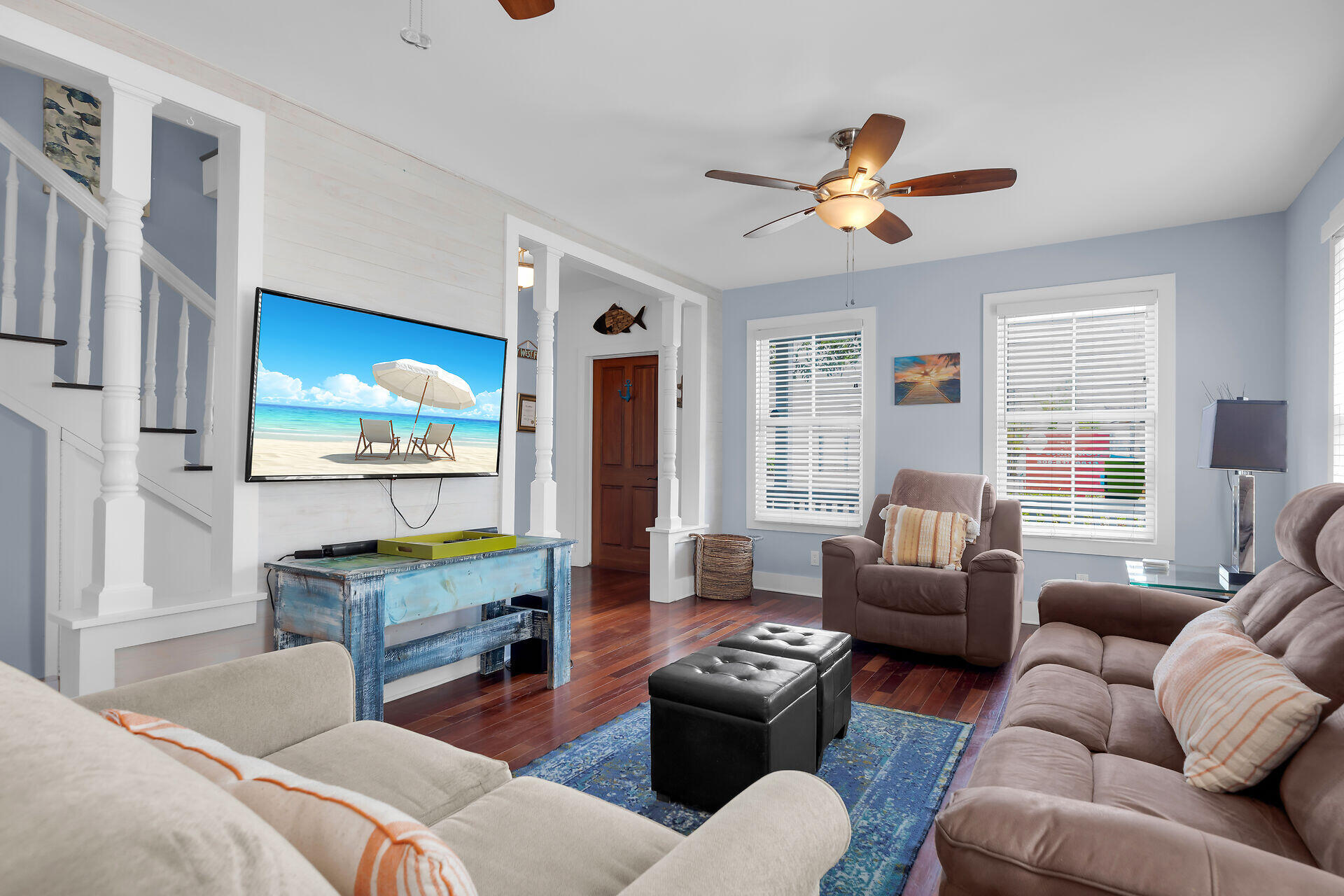 1124 Eaton Street Key West, FL 33040 - Photo 2 of 28 a living room with furniture a chandelier fan and a window