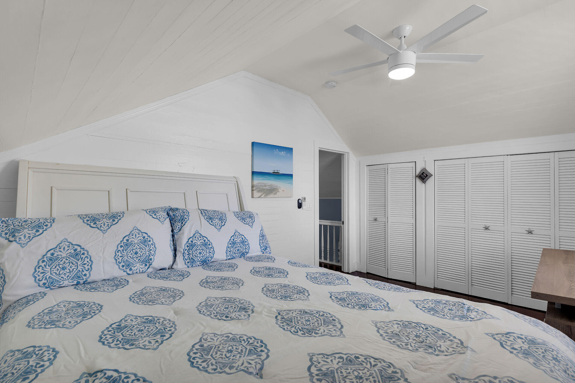 1124 Eaton Street Key West, FL 33040 - Photo 23 of 28 a bedroom with a large bed and a window