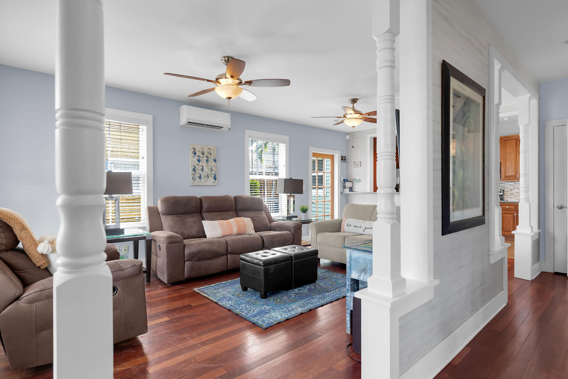 1124 Eaton Street Key West, FL 33040 - Photo 4 of 28 a living room with furniture and a chandelier