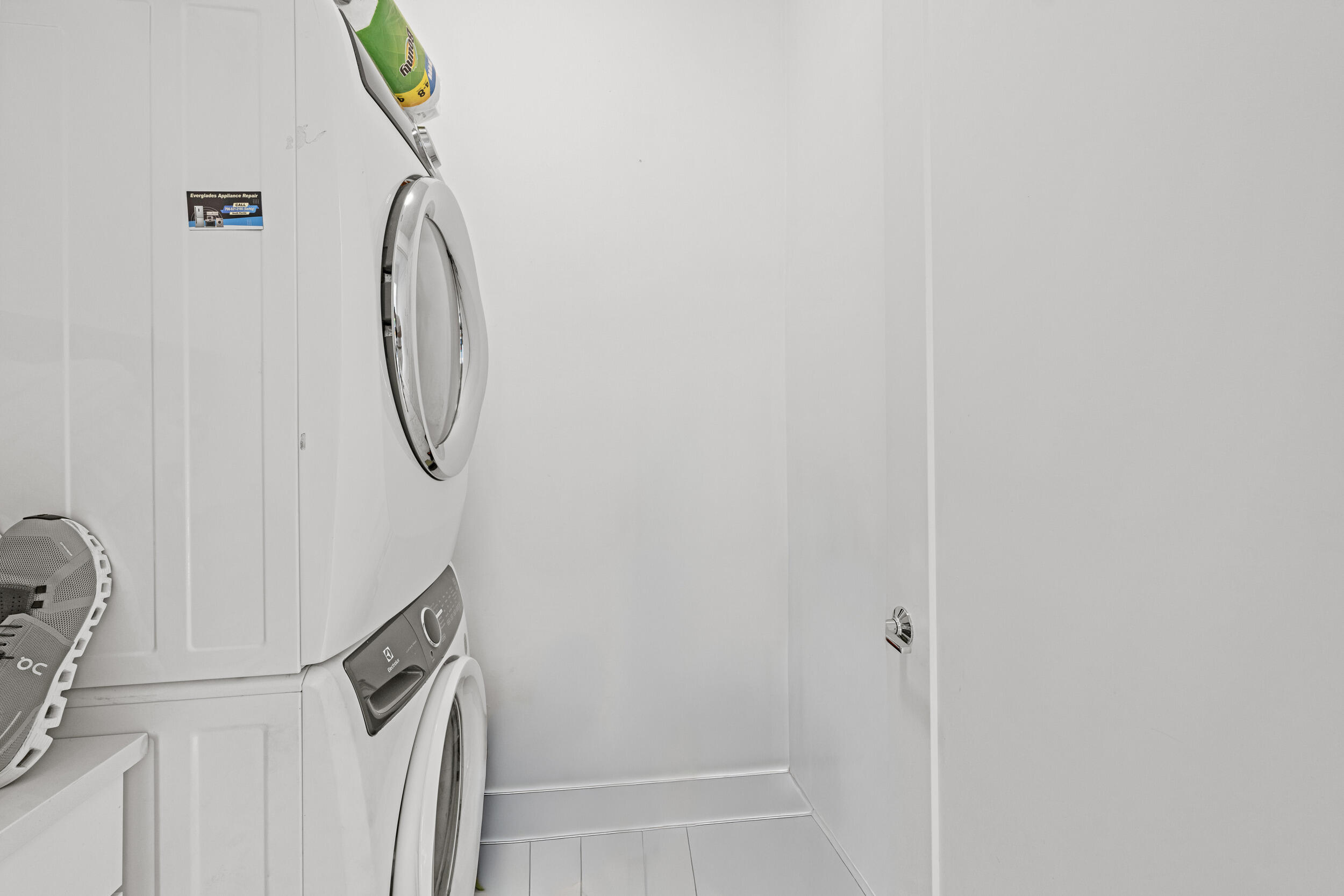 1811 Northwest 42nd Drive Boca Raton, FL 33431 - Photo 24 of 52 a view of a room with rack on the wall