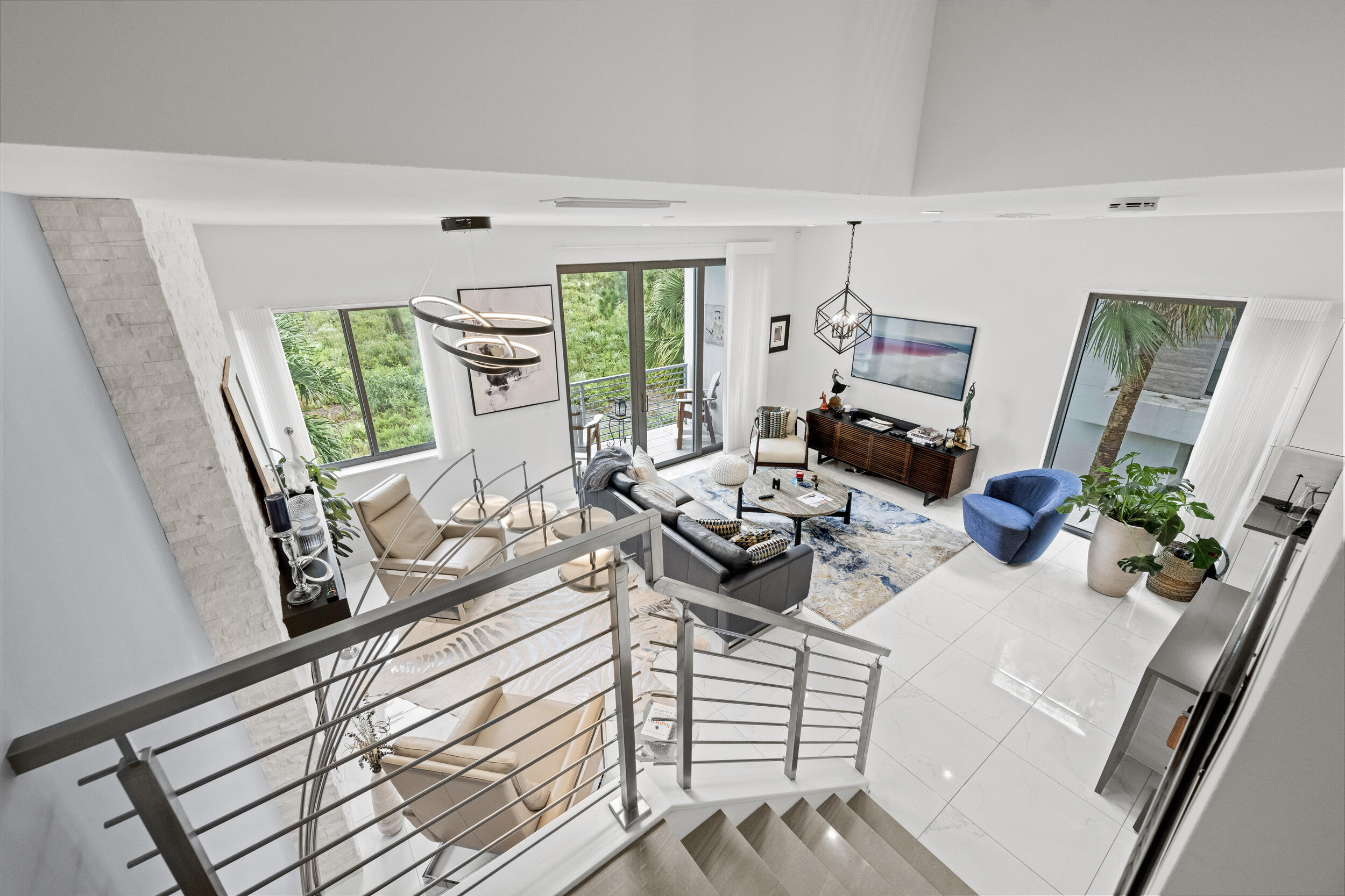 1811 Northwest 42nd Drive Boca Raton, FL 33431 - Photo 25 of 52 a living room with furniture and a large window