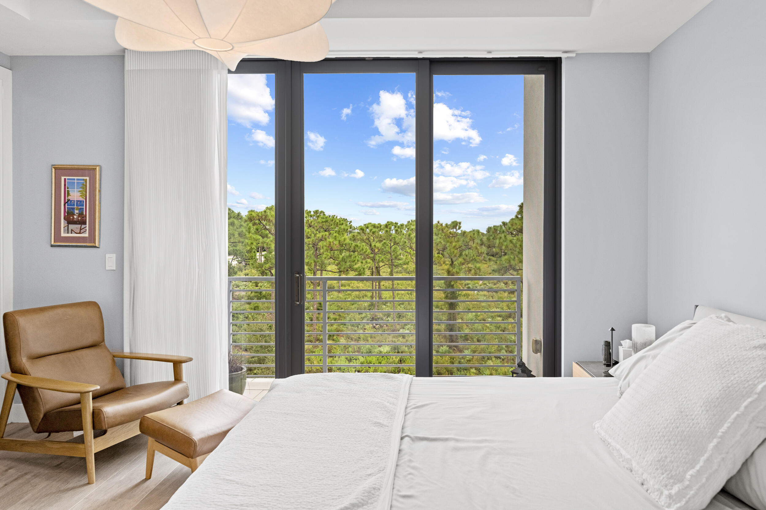 1811 Northwest 42nd Drive Boca Raton, FL 33431 - Photo 35 of 52 a bedroom with a bed and large windows