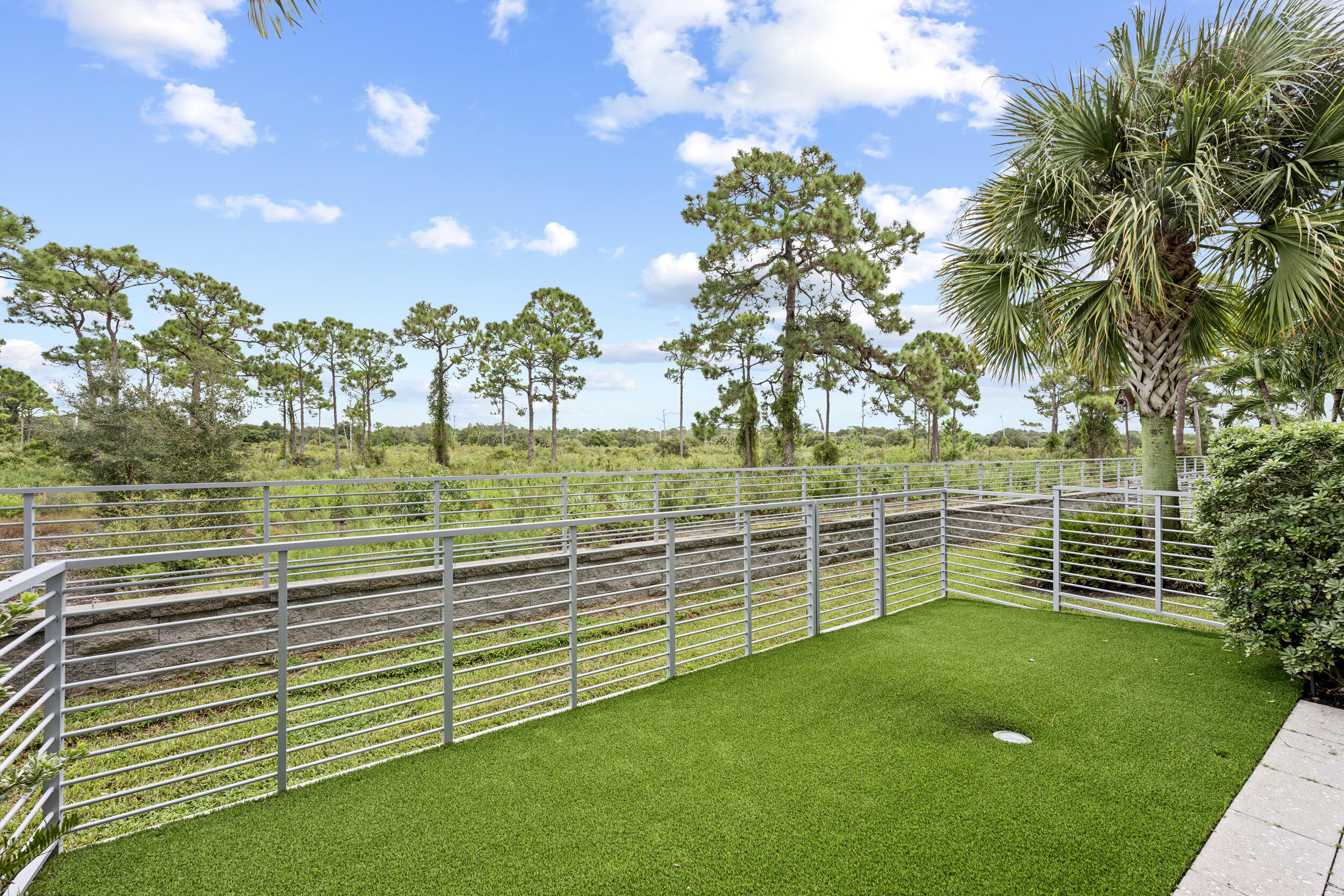 1811 Northwest 42nd Drive Boca Raton, FL 33431 - Photo 40 of 52 a view of a big yard with wooden fence