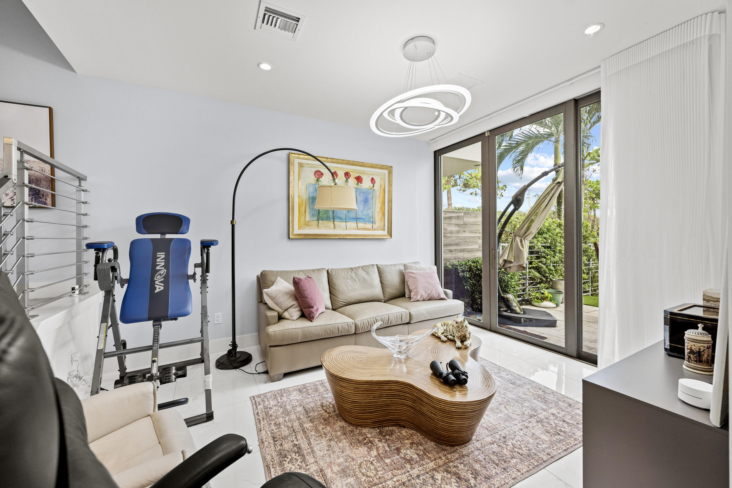 1811 Northwest 42nd Drive Boca Raton, FL 33431 - Photo 5 of 52 a living room with furniture and a large window