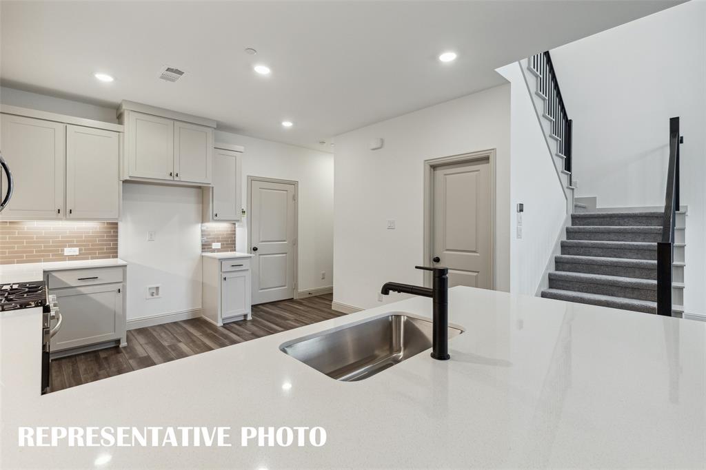 220 Dylan Way Midlothian, TX 76065 - Photo 6 of 16 Open and inviting, this gorgeous kitchen is everything you have been searching for! REPRESENTATIVE PHOTO