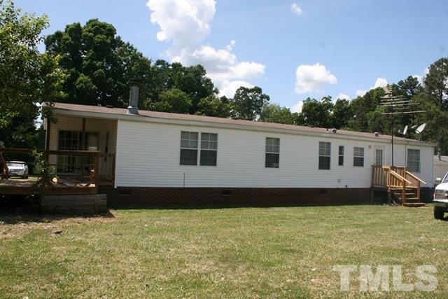54 Gm Robertson Road Roxboro, NC 27574 - Photo 3 of 17 a house view with a garden space