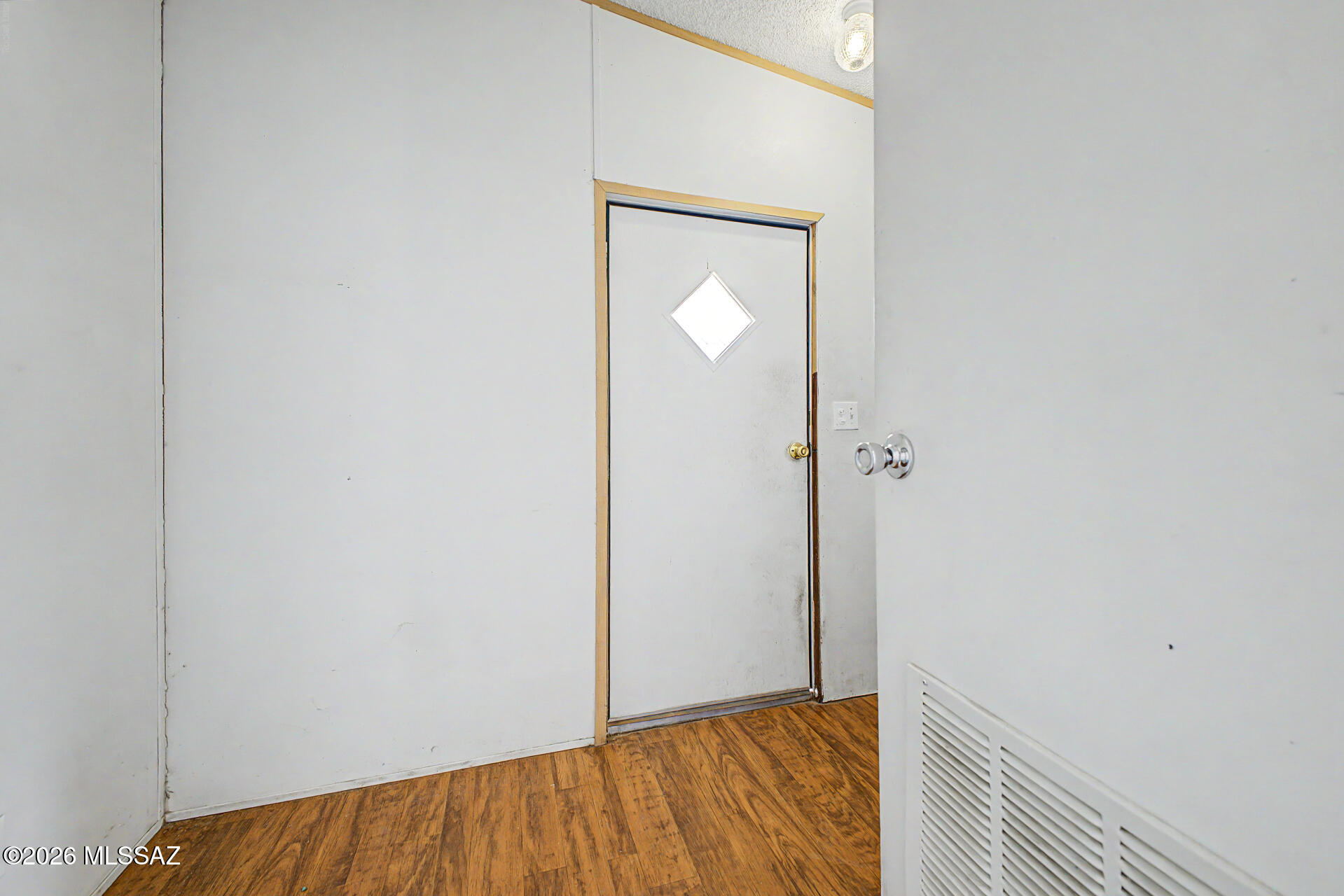 1911 West Thunder Road Vail, AZ 85641 - Photo 26 of 38 a view of hallway with wooden floor