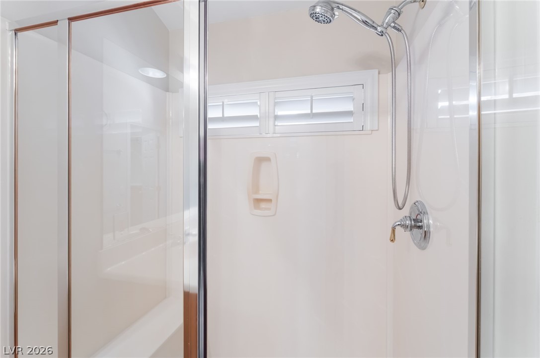 10481 Riverside Park Avenue Las Vegas, NV 89135 - Photo 23 of 51 Full bath with a stall shower