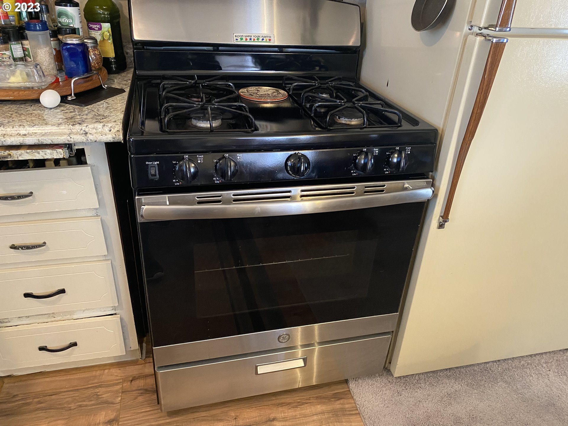 3900 Coburg Road, Unit 52 Eugene, OR 97408 - Photo 11 of 17 a stove top oven sitting inside of a kitchen