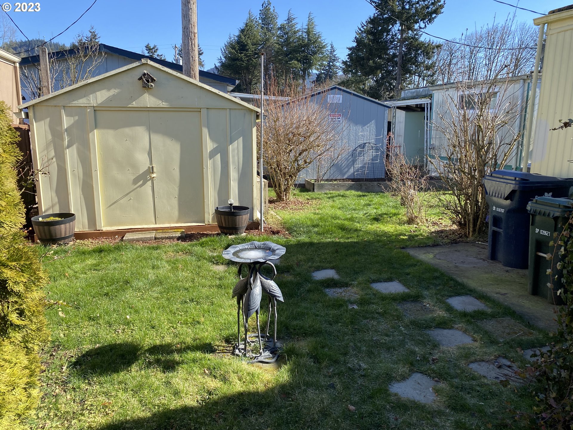 3900 Coburg Road, Unit 52 Eugene, OR 97408 - Photo 14 of 17 a front view of a house with garden