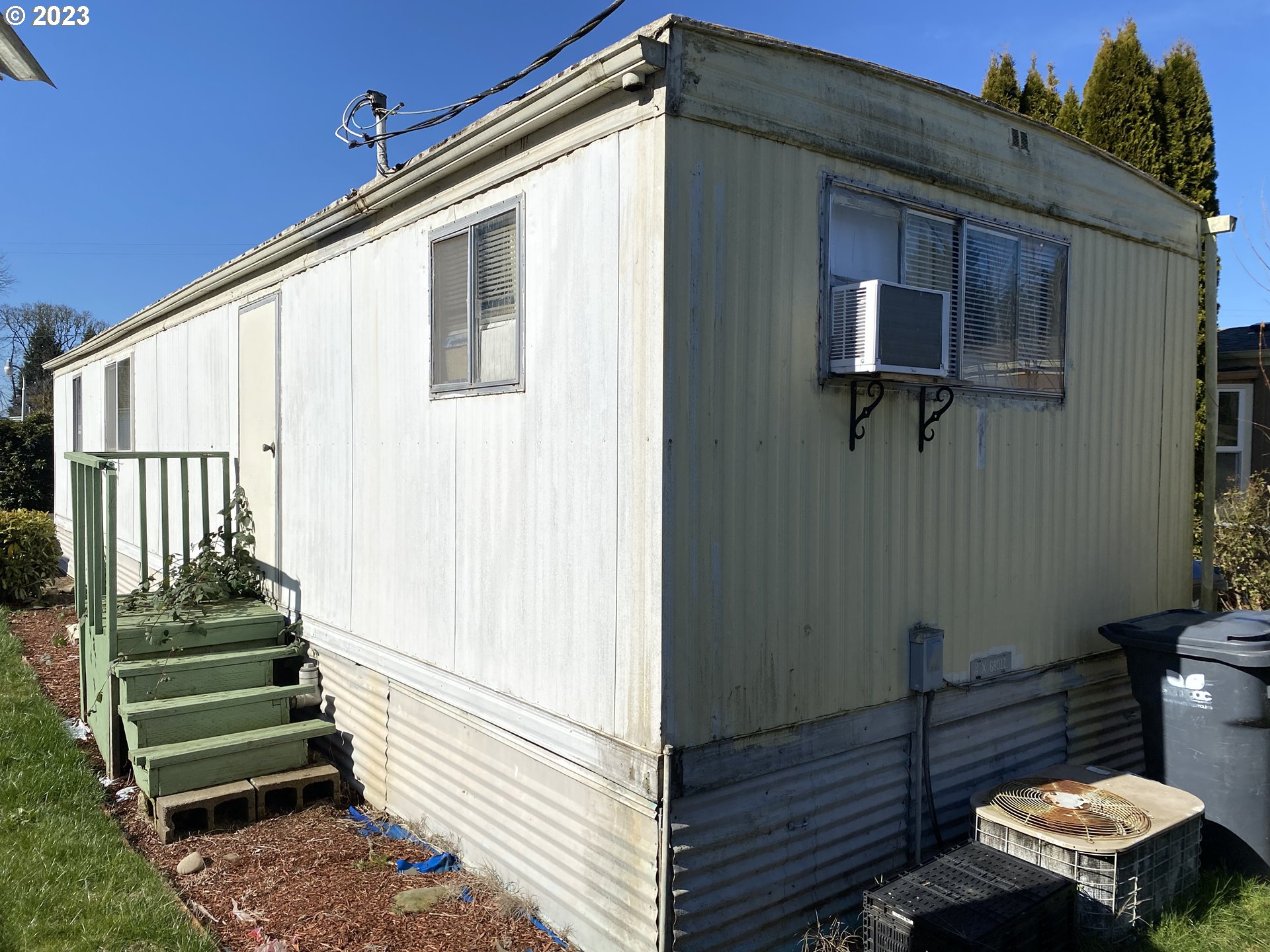 3900 Coburg Road, Unit 52 Eugene, OR 97408 - Photo 16 of 17 a view of a house with a small deck